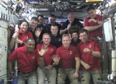 Image released by NASA, all twelve Discovery and International Space Station crew members .