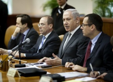 Israeli Prime Minister Benjamin Netanyahu, second right, convenes the weekly cabinet meeting in Jerusalem, Sunday, March 6, 2011.