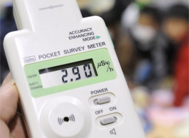 A pocket radiation detector shows 2.9 micro-sieverts per hour at an evacuation center in Koriyama for people living around the Fukushima Dai-ichi nuclear plant Tuesday afternoon, March 15, in Fukushima Prefecture.