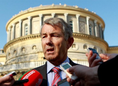Independent TD Michael Lowry speaks to the media on the plinth of Leinster House in Dublin.