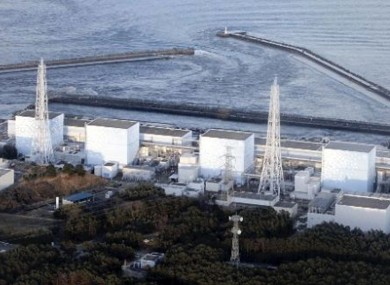 A photograph of the Fukushima I nuclear plant in Japan. The square building to the right of this photo has been significantly damaged following an explosion, local TV said.