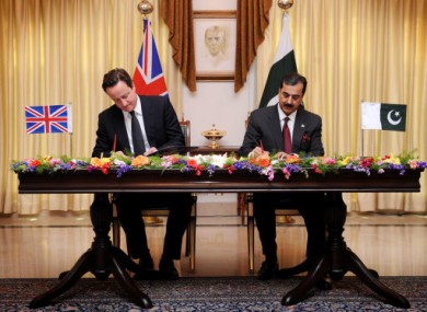 Prime Minister David Cameron signs an Enhanced Strategic Dialogue document between the UK and Pakistan with Pakistan Prime Minister Yusuf Raza Gilani.