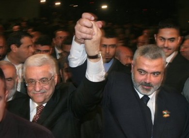 Palestinian Authority President Mahmoud Abbas, left, and Prime Minister Ismail Haniyeh from Hamas