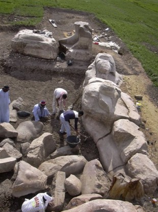 Image released today by the Supreme Council of Antiquities showing the 42-foot statue unearthed by archaeologists recently.