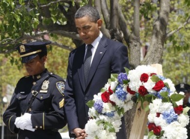 President Barack Obama pauses after laying a wreath at the National Sept. 11 Memorial at Ground Zero in New York, Thursday, May 5, 2011.