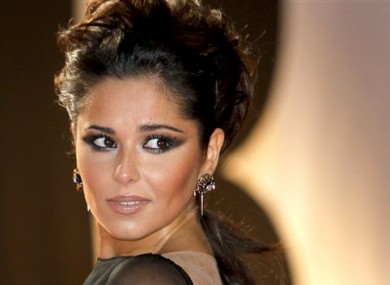 Cheryl Cole arrives for the Brit Awards 2011 at The O2 Arena in London.