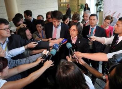 Minister of Environment, Rural and Marine Affairs of Spain, Rosa Aguilar Rivero, center, speaks to journalists.