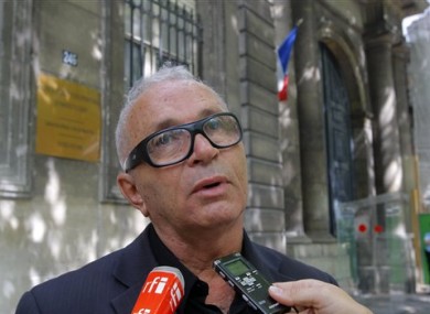 Nelson Marinho, president of Brazil's association of victims' families, answers reporters questions in Paris,Wednesday June 15, 2011.