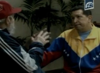 Where's Hugo? He's deep in conversation with Fidel Castro.