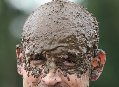 A competitor in the Swamp Soccer World Cup being held at Hunters Hall Park in Edinburgh.