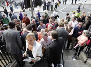 Would-be buyers queue outside the first distressed property auction at the Shelbourne in Dublin in April