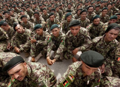 Afghan army soldiers look on during their graduation ceremony at the National Army's training center on the outskirts of Kabul, Afghanistan, Thursday, July 28, 2011.