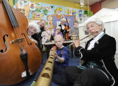 National Concert Hall musicians with patients at today's workshop in Our Lady’s Hospital for Sick Children in Crumlin (L-R) Andrew Mullins aged 22 months, Vilins Greicion age 10, Michael Walsh O'Brien age 10 and Colin Holden age 13.