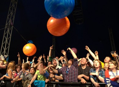 The crowd at Mitchelstown's Indiependence music festival in Co Cork play with giant bouncing balls during Ham Sandwich's set