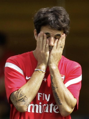 Cesc looks about as tired of all this as we are.