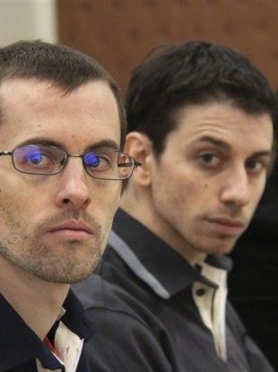 File photo dated 6 February 2011 of US hikers Shane Bauer, left, and Josh Fattal in court in Tehran.
