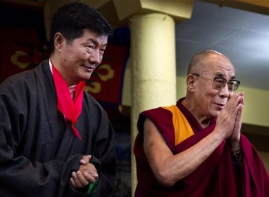 Lobsang Sangay, left, the new prime minister of Tibet's government in exile, stands next to Tibetan spiritual leader the Dalai Lama.