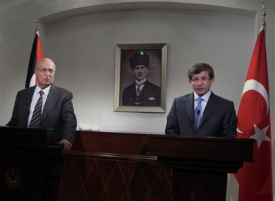 Nabil Shaath, advisor to Palestinian president Mahmoud Abbas, left, and Turkey's Foreign Minister Ahmet Davutoglu speak to the media after their talks in Ankara, Turkey, Monday, Sept. 5, 2011.