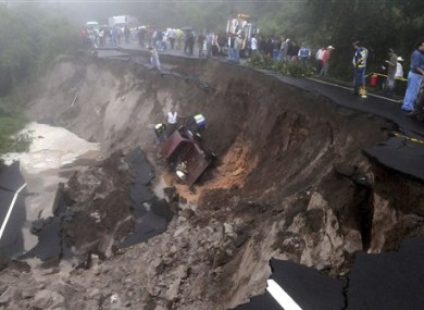 A landslide caused by heavy rains at the Pan American an highway La Cuesta de la Moramulca, 52 Km. from Tegucigalpa, Honduras, Monday, Oct. 17, 2011.