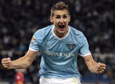 Miroslav Klose celebrates after scoring the winner for Lazio in Sunday's Rome derby.