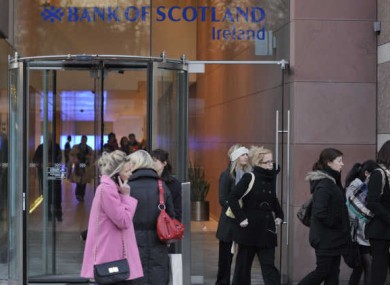 Workers outside BOSI after its closure in 2010. Certus was set up to manage the bank's loans.