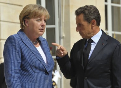 File photo of Angela Merkel and Nicolas Sarkozy.