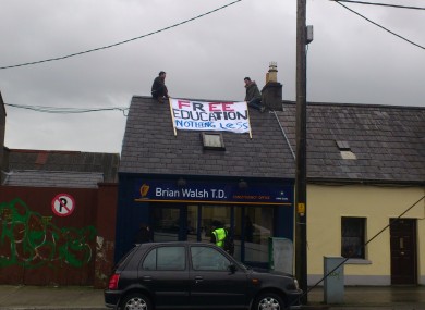 The students have climbed on to the roof of the constituency office.