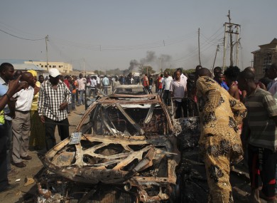 The scene of yesterday's bomb explosion at St Theresa's church in Madalla, Nigeria..