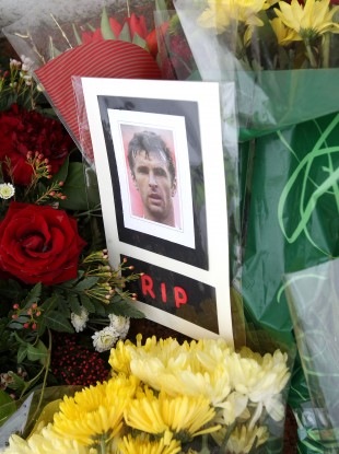 A photo left in respect of Wales manager Gary Speed outside the gates to Cardiff City's Ninian Park.