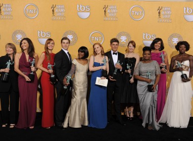 The cast of 'The Help' celebrate after winning the top award at the SAG awards.