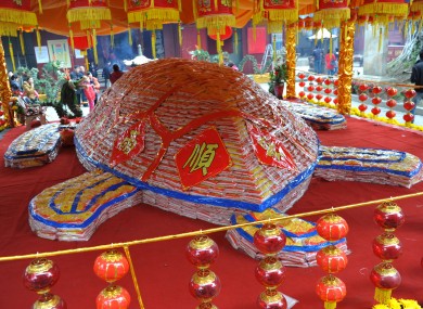 A rice tortoise, made of 50,000kg of rice, is displayed at Thean Hou Temple in Fujian, China