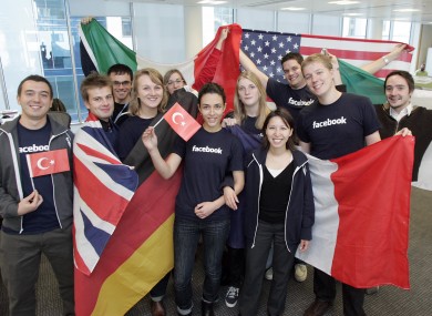 Staff at Facebook's Dublin offices pose in 2009. Facebook is reportedly seeking to more than double its Irish presence in the coming years.