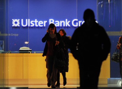Staff leave Ulster Bank's headquarters at the IFSC on the day they were told that 600 jobs were being cut in the Republic of Ireland, with another 350 being lost in the North.