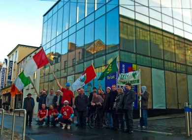 The protest group outside the 'liberated' building