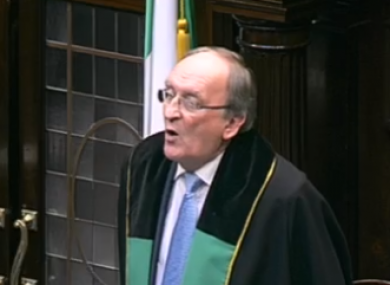 Ceann Comhairle Sean Barrett insisted on proceeding with a vote on suspending Michael McNamara - even though he had already left the chamber.