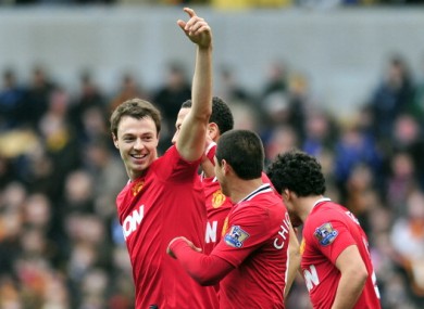 The Northern Ireland defender celebrates his first Manchester United strike.