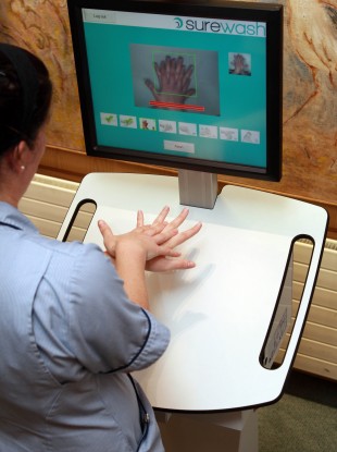 Pictured at a Hand Hygiene day in the Mater Private Hospital, Dublin, a nurse demonstrates the innovative SureWash system which is now in use at the hospital.