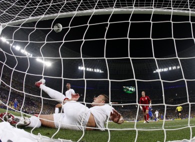 England's John Terry clears the ball away from his goal during the Euro 2012 clash against Ukraine in Donetsk last night.