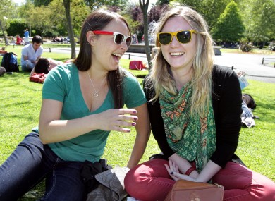Michelle Underwood, left, from Los Angeles and Aisling Malone from Leixlip, Co. Kildare in St Stephens Green, Dublin enjoying a spot of sun last month.