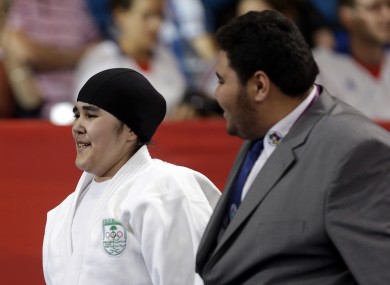 Wojdan Shaherkani's participation was only guaranteed on Tuesday, when a row over her headgear was resolved.