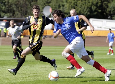 Berwick Rangers' Steven Notman (left) battles with Rangers' Francisco Sandaza during the Scottish Division 3 match.