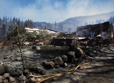 A scorched and burnt farm appears after the ravages of a wildfire which swept through parts of La Gomera, the Canary Islands