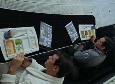 Computer tablets similar to the iPad being used in 2001: A Space Odyssey.