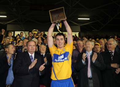 Clare captain Conor McGrath lifts the cup.