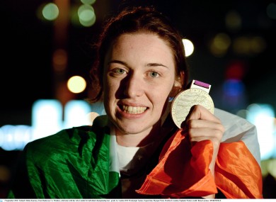 Ireland's Helen Kearney, from Dunlavin, Co. Wicklow, celebrates with her silver medal for individual championship test - grade 1a.