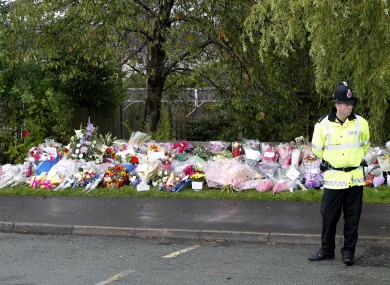 Floral tributes near to the scene where Pcs Fiona Bone and Nicola Hughes who were killed in Hattersley, Tameside on Tuesday.