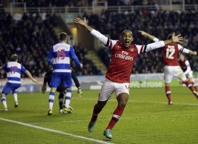 Theo Walcott celebrates as Arsenal stage a remarkable comeback.