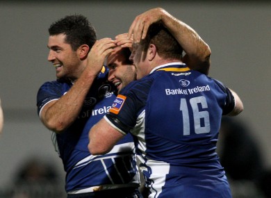 Rob and Dave Kearney celebrate a Leinster try with Sean Cronin (right).