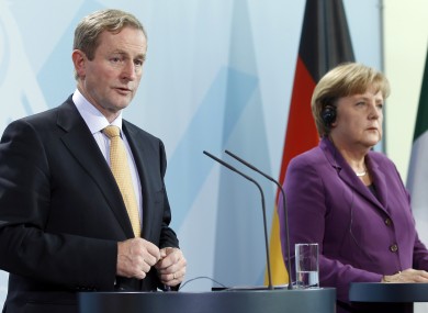 Enda Kenny and Angela Merkel speak to reporters after a meeting in Berlin last year. The two have issued a joint statement today acknowledging Ireland's financial situation is