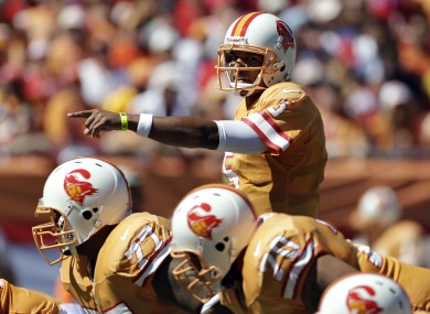 Tampa Bay Buccaneers quarterback Josh Freeman calls the play.